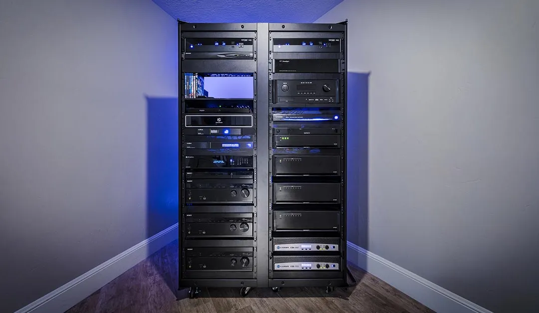 Professionally wired AV rack with labelled components, neat layout, and quiet cooling for long-term reliability.